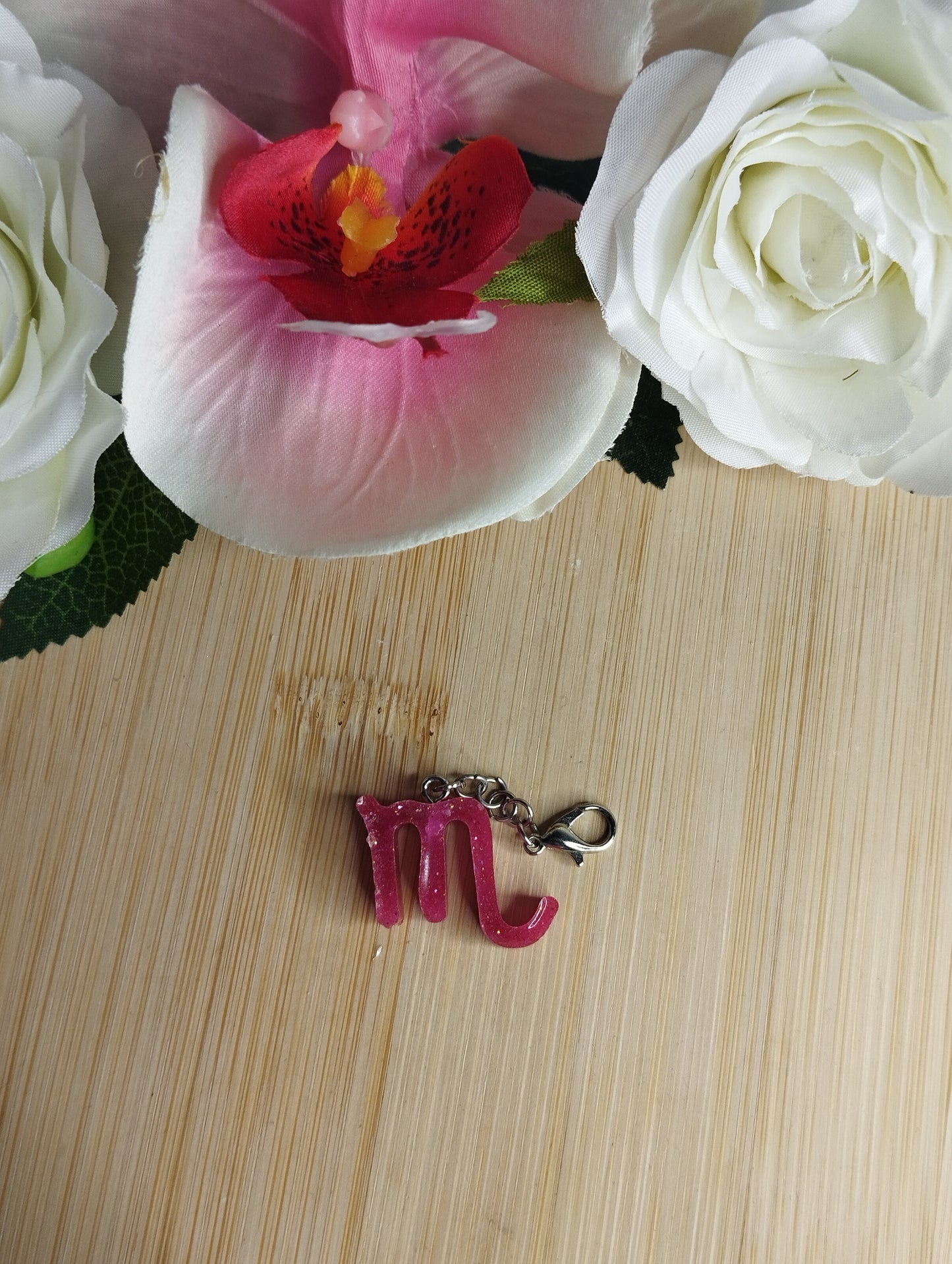 Signe Fuchsia pailleté
